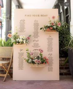 a seating chart with flowers on it