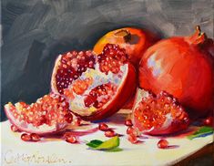 a painting of pomegranates on a table