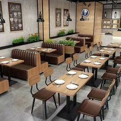 an empty restaurant with wooden tables and chairs