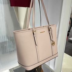 Michael Kors Jet Set Travel Large Top Zip Shoulder Tote Saffiano Leather Powder Blush Nwt 100% Authentic Style# 35f0gtvt9l Was $448.00$ Mk Note: Our Jet Set Travel Tote Is A Timeless Style For Every Season. Crafted From Saffiano Leather Accented With A Top-Stitch Trim, It Opens To A Spacious Interior With Plenty Of Room To Store All Your Essentialsbe It For A Day Or For An Entire Weekend. Use The Inside Slip Pocket To Stow Small Items That Require Easy Access. Details Tote Bag Saffiano Leather 1 Brown Leather Tote Bag, Mk Purse, Leather Tote Purse, Michael Kors Tote Bags, Brown Leather Totes, Nylon Tote Bags, Black Leather Tote, Powder Blush, Nylon Tote