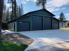 two garages in the middle of a driveway