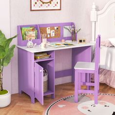 a child's desk and chair in a room