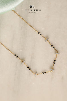 A static image of different mangalsutras, crafted with Cubic Zirconia and black beads. The brand name and logo, 'Paksha' is visible. Everyday Mangalsutra, Gold Chain Design, Mangalsutra Designs, Fish Patterns, Jewellery Gold, Gold Jewelry Indian