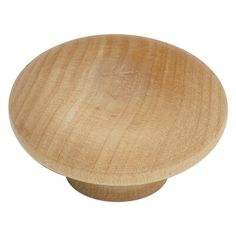 a wooden knob on a white background