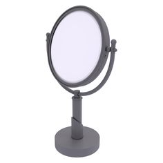 a small round mirror on top of a metal stand with a white light in the middle