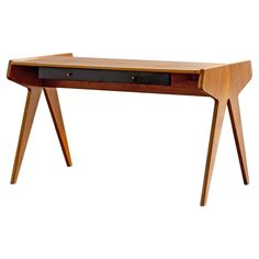 a wooden desk with two drawers on one side and an open drawer on the other