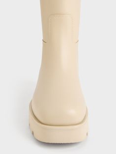 On-trend and practical, this beige iteration of our calf boots is perfect for those looking to add a lighter tone to their shoe collection. They feature a simple and minimalist silhouette marked with edge stitching on the uppers that lends subtle visual interest. Resting on sturdy ridge soles, these calf boots will see you through rain and shine -- they are perfect for unpredictable trans-seasonal weather. Plus, the double side tabs make them easy to wear. Belt Ring, Edge Stitching, Minimalist Silhouette, Edge Stitch, Charles Keith, Kids Sale, Calf Boots, Sales Gifts, Shoe Collection