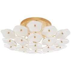 a white and gold ceiling light with flowers on the bottom, in front of a white background