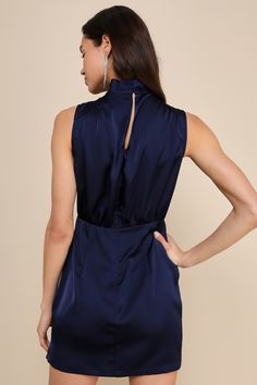 Feel like pure royalty for an evening in in the Lulus Classic Elegance Navy Satin Sleeveless Mock Neck Mini Dress! Luxe woven satin shapes this gorgeous dress that has a mock neckline and a sleeveless bodice with gathered fabric detailing. An elasticized waist tops a flirty mini skirt complete with a side notch. Keyhole opening and double button closure at back. Hidden back zipper/clasp. Fit: This garment fits true to size. Length: Mid-thigh. Size medium measures 34.5" from shoulder to hem. Bust Mini Dress Satin, Fabric Detailing, Gathered Fabric, Sleeveless Mock Neck, Mock Neck Mini Dress, Black Tie Gala, Swimwear Dress, Mock Neckline, Selling Clothes