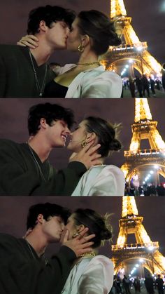 two people kissing in front of the eiffel tower