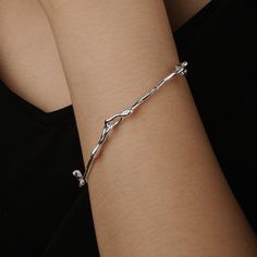 The Unbreakable Vow bracelet is inspired by our beautiful nature and it is a perfect unique gift for nature lovers. It is minimalist style and made in sterling silver. It is made from branch-form cased metal which form is like a branch twisted around the hand. This elegant and delicate bracelet is perfect for everyday wear, and also suitable for special occasions, like dates, parties, etc. Materials:  s925 Sterling Silver   Cyan Art Store creates dainty jewelry that is inspired by antique and tr The Unbreakable Vow, Unbreakable Vow, Branch Bracelet, Belle Nature, Bangle Silver, Unisex Bracelets, Style Minimaliste, Bracelet Argent, Gifts For Nature Lovers