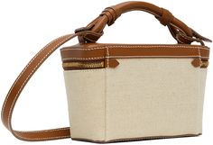 Cotton- and linen-blend canvas and buffed calfskin shoulder bag in beige and brown. · Fixed rolled carry handle · Adjustable and detachable shoulder strap · Logo embroidered at face · Two-way zip closure · Patch pocket at interior · Card slot at interior · Twill lining · Contrast stitching in white · H5 x W9 x D3 Supplier color: Naturel/Marron Vanity Case Bag, Vanity Case, Beige Brown, Contrast Stitch, Cotton Bag, Logo Embroidered, Patch Pocket, Linen Blend, Calf Skin