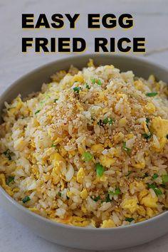 an egg fried rice dish in a bowl with the words, easy egg fried rice