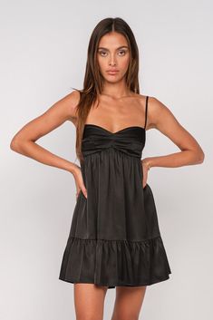 Discover the Bailey Black Satin Babydoll Mini Dress at BohoPink.com! Black satin babydoll mini dress with ruffle hem. Express shipping is available! Formal Babydoll Dress, Cute Black Dresses Casual, Black Mini Dress Flowy, Babydoll Black Dress, Elegant Black Flowy Mini Dress, Black Babydoll Dress Satin, Black Flowy V-neck Mini Dress, Satin Babydoll, Flowy Dress Short