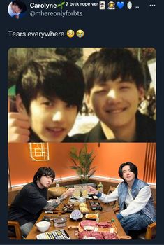 two boys sitting at a table with food in front of them and one boy smiling