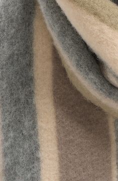 Heathered stripes hint at the cozy softness of this fringed scarf that wraps you in the warmth of an alpaca-and-wool blend to stop the season's chill in its tracks. 13" x 79" 50% alpaca, 37% wool, 13% polyamide Dry clean Made in Italy Alpaca Wool, Rag & Bone, Alpaca, Wool Blend, Dry Clean, Stripes, Nordstrom, Italy, Wool