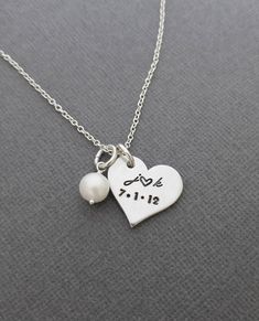 "« Personalized Necklace with Initials and Date // Anniversary Necklace // Hand Stamped Jewelry // Hand Stamped Necklace » Have this pretty heart pendant hand stamped with the initials and date of your choice to make the perfect gift! This necklace makes such a cute gift or keepsake and a cute way to carry a meaningful part of your life with you. The 3/4\" heart and freshwater pearl are hung from an 18\" oval link chain. Please let me know in the 'note to seller' box during checkout with the ini Meaningful Heart-shaped Wedding Jewelry, Personalized Pendant Heart Necklace For Wedding, Personalized Heart Pendant Necklace For Wedding, Silver Hand Stamped Heart Necklace For Anniversary, Heart-shaped Wedding Necklaces, Personalized Heart Pendant Charm Necklace For Wedding, Heart Necklace With Charms For Valentine's Day Wedding, Wedding Personalized Heart Pendant Charm Necklace, White Charm Necklace For Wedding On Valentine's Day