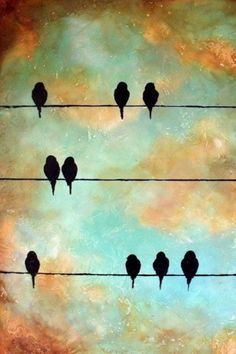 four birds are sitting on wires in front of a painting