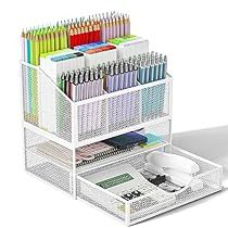 a white desk organizer with pens and pencils