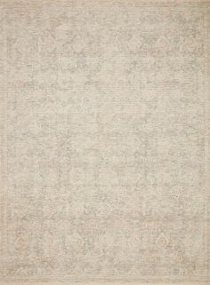 an area rug with white and grey colors