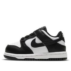 Best gifts for newborns/babies! The Nike Dunk Low TD Black White is a toddlers shoe that features a classic black and white colorway. It is made with leather and has a white base with black overlays. The Swoosh branding is black, and the shoe has a lightly padded nylon tongue. The tooling is two-toned, with a rubber outsole that draws from the Air Jordan 1 for traction. (SNKR/Skate/Light/Low Top) Baby Jordan Shoes, Nike Baby Shoes, Black Skate Shoes, Nike Shoes For Boys, Nike Kids Shoes, Toddler Nike Shoes, Gifts For Newborns, Baby Jordans, Baby Nike