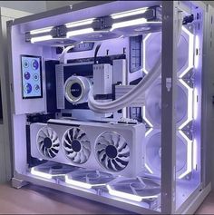 the inside of a computer case with fan lights