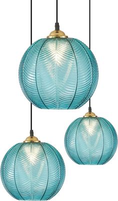 three blue glass pendant lights hanging from the ceiling