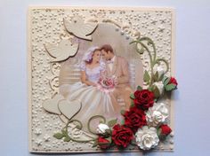 a wedding card with roses and butterflies on it