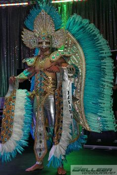 a man dressed in an elaborately decorated costume