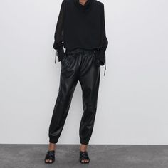 Black Zara Faux Leather Elastic Drawstring Waist Joggers Pants High-Waisted Pants With Elastic Waistband With Adjustable Drawstring. Front Pockets. Elastic Cuff Hems. Casual Leather Pants With Elastic Waistband For Fall, Fall Leather Pants With Elastic Waistband For Work, Zara Black Leather Pants For Spring, Jogging Pants Women, Jogging Pants Black, Satin Joggers, Women Jogger Pants, Leather Joggers, Waterproof Pants