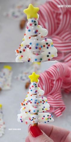 a hand holding a small christmas tree made out of sprinkles and candy