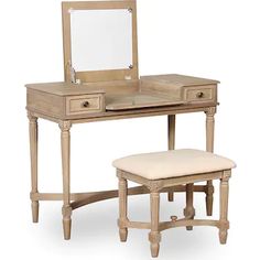 an antique vanity with stool and mirror