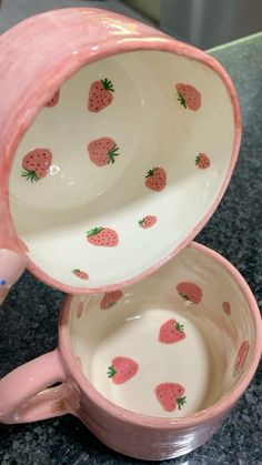 two bowls with strawberries painted on them