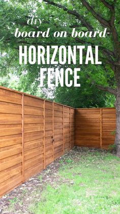 a wooden fence with the words diy board on board horizontal fence