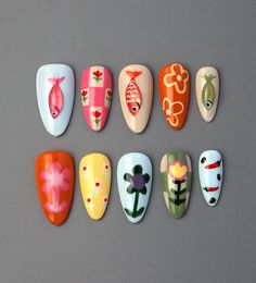 ❤Handmade❤ ❤Unique❤ ❤Reusable❤ ❤Hello, dear. Greetings and welcome to my store. Hope you find a style you like❤ ❤About Product❤ This colorful summer nail art is incredibly cute and fun! The flower, vegetable, and fish patterns on the press-on nails add a lively touch, making the nails burst with vibrant colors and a hint of playfulness. Such short almond nail art designs are full of joy and imagination. Wearing these nails is sure to bring a cheerful mood and showcase your personality charm. ❤Materials: gel❤ I only work with high-quality materials to create sturdy & long-lasting luxury press on nails that you can trust on. ❤Size:❤ XS: 15mm, 12mm, 13mm, 11mm, 9mm S: 16mm, 13mm, 14mm, 12mm, 9mm M: 17mm, 13mm, 14mm, 12mm, 10mm L: 18mm, 14mm, 15mm, 13mm, 11mm If you would like a custom size, p Short Almond Nail Art, Nail Short Almond, Fish Nail Art, Fish And Flowers, Fish Nails, Nail Short, Almond Nail Art, 3d Fish, Flowers Acrylic