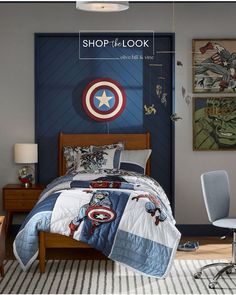 a bed room with a captain america comforter