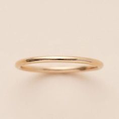 This is the thickest solid band that we offer. It goes with everything & is really simple. It's a great base ring to any stack or sneak it in the middle to really make a statement. This is a classic solid band that can be worn everyday. Details:Location: Finger (order larger or smaller sizes depending on which finger you choose to wear it)Thickness: Band: 1.5mmSizes: 5,6,7,8Style: MinimalistMade with: 14K Gold Filled Stacking Rings, Gold Filled, Band, Gold