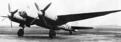 an old black and white photo of a plane on the tarmac with it's propeller still attached