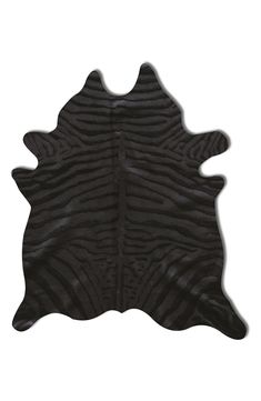 a black and white zebra print area rug on a white background with an animal skin pattern