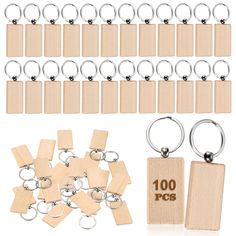 wooden keychains, blank tags and metal rings on a white background with clippings