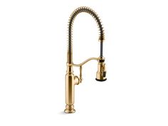 the kitchen faucet is shown in gold and has a pull out sprayer