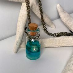 You Have No Idea What Just Washed Up From The Sea! A Tiny Bottle With Mermaid Tears, Seaweed, And A Small Pearl! All If This Is One A Necklace With A Tiny Bow In A Old Vintage Bronze Color. Oh, If Every Day Came With Such A Treasure.. Mermaid Amulet, Tiny Mermaid, Mermaid Tears, Tiny Bow, Bottle Necklace, You Have No Idea, Old Vintage, Bronze Color, Womens Jewelry Necklace