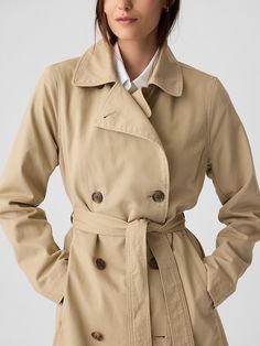 Modern Trench Coat Chic Button-up Outerwear With Belted Cuffs, Belted Outerwear For Business In Fall, Classic Collared Outerwear With Belted Cuffs, Collared Outerwear With Belted Cuffs For Office, Business Casual Outerwear With Belted Cuffs And Lapel Collar, Solid Outerwear With Belted Cuffs For Work, Casual Belted Business Outerwear, Spring Collared Belted Outerwear, Casual Belted Outerwear For Business