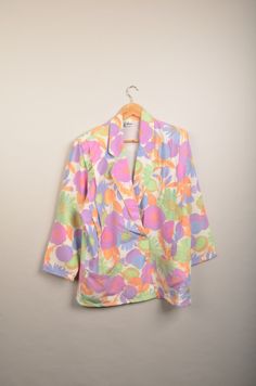 "Vintage flower blazer in great vintage condition. Very nice eye catcher Amazing flower print. Has shoulder pads. Size: Not available (check measurements) MEASUREMENTS: - Chest(armpit to armpit: 57cm(22.4\") - Length from the backside(Center bottom of the collar to center bottom of the garment): 75(29.5\") - Sleeve(Shoulder seam to end of arm cuff): 55cm(21.6\") - Shoulder to shoulder seam: 45cm(17.7\") NOTE: Due to the age, clothing/items can shrink or it may be that the sizing from that time t Flower Blazer, 90s Blazer, Trendy Blazers, 90s Jacket, Modern Clothing, Arm Cuff, Oversized Blazer, Vintage Coat