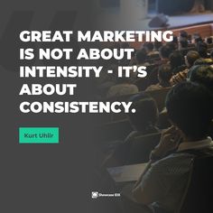 an audience in a lecture hall with the quote great marketing is not about intensity - it's about constistency