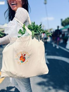 Get rid of all the plastic and pack your goodies in this spacious organic cotton tote bag. Fill it up with groceries, books, and travel essentials--there's room for everything! * 100% certified organic cotton 3/1 twill * Fabric weight: 8 oz/yd² (272 g/m²) * Dimensions: 20″ × 14″ × 5″ (50.8 × 35.6 × 12.7 cm) * Capacity: 6 gallons (23 l) * Weight limit: 30 lbs (13.6 kg) * 1″ × 25″ (2.5 × 63.5 cm) long self-fabric dual straps * Open main compartment, flat bottom * Blank product sourced from Vietnam Cali, Hand Designs, Canvas Tote Bag, Large Tote, Cotton Tote Bags, Large Bags, Canvas Tote, Travel Bag, Fabric Weights