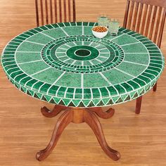 a table with green and white tile on it