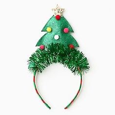 Tinsel and your very own tiny Christmas tree top this cute headband complete with pom pom ornaments and a gold star! The perfect headband for holiday parties! Christmas Tree Headband, Festival Hair Accessories, Tiny Christmas Trees, Christmas Watches, Christmas Tree Tops, 25 Days Of Christmas