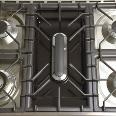 a stove top with two burners and an oven door