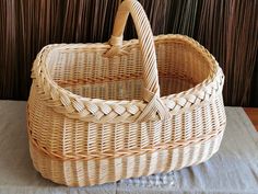 a wicker basket sitting on top of a table